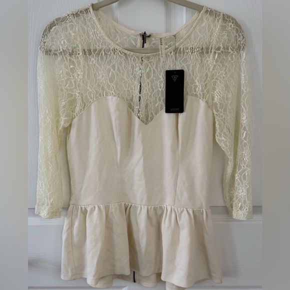 NOT FOR SALE
GUESS PEPLUM BLOUSE TOP
CREAM LONG SLEEVE BACK ZIP - Picture 9 of 12
